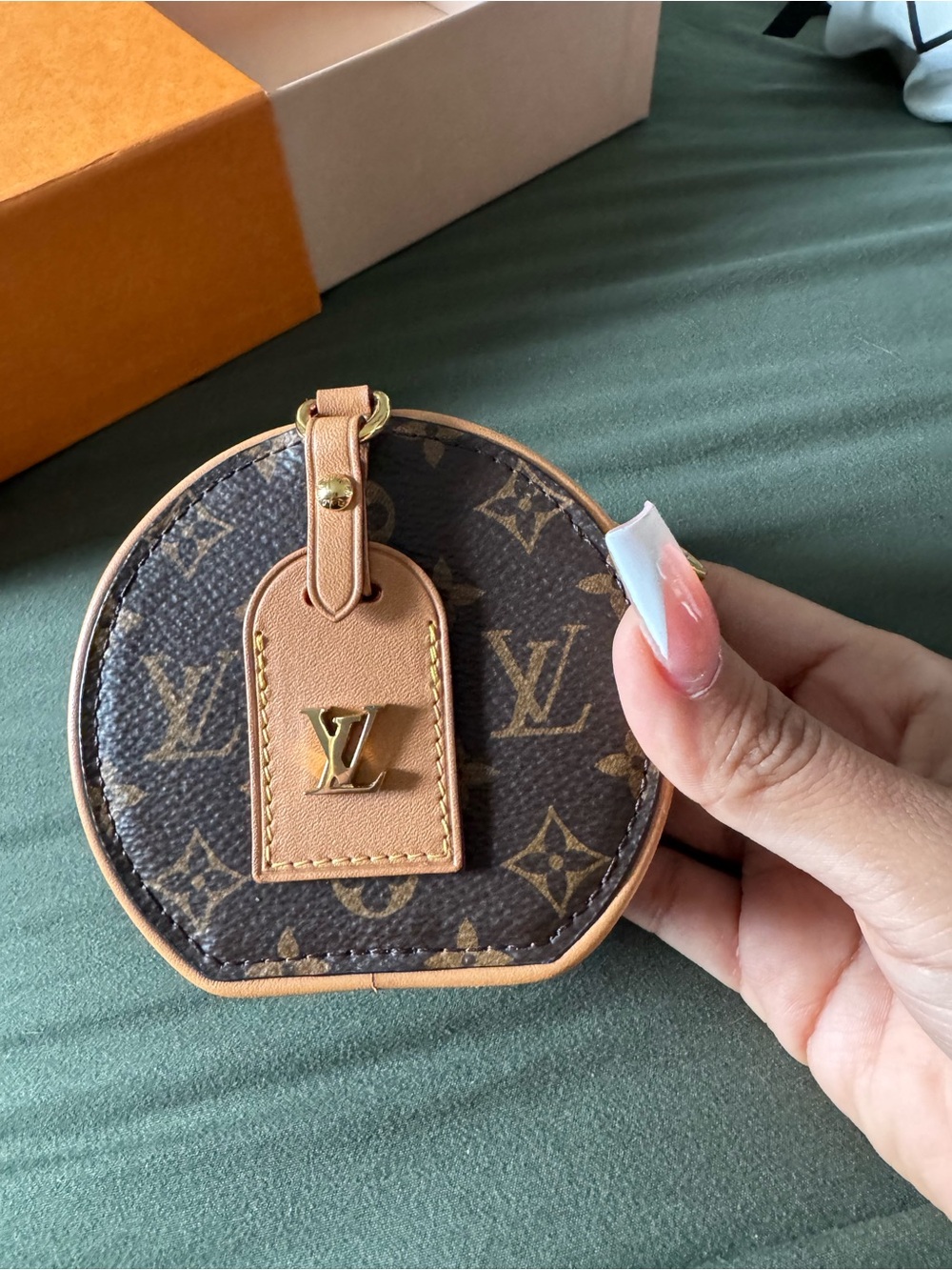 LOUIS VUITTON
Monogram Canvas Boite Chapeau Necklace Bag